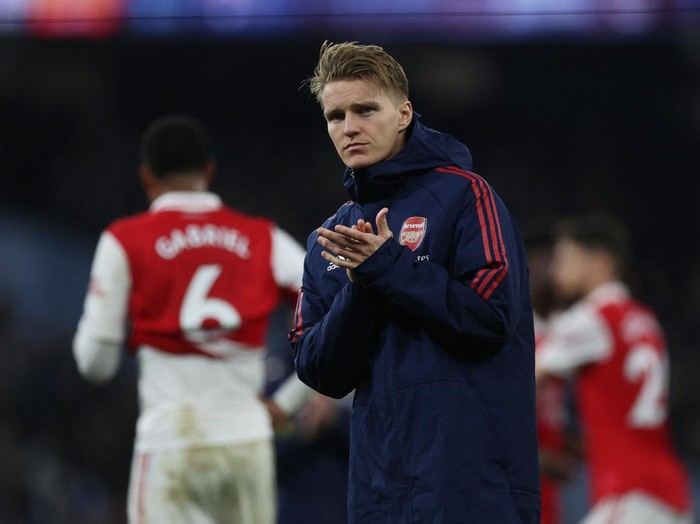 Soccer Football - Premier League - Manchester City v Arsenal - Etihad Stadium, Manchester, Britain - April 26, 2023 Arsenal's Martin Odegaard looks dejected after the match Action Images via Reuters/Lee Smith EDITORIAL USE ONLY. No use with unauthorized audio, video, data, fixture lists, club/league logos or 'live' services. Online in-match use limited to 75 images, no video emulation. No use in betting, games or single club /league/player publications.  Please contact your account representative for further details.