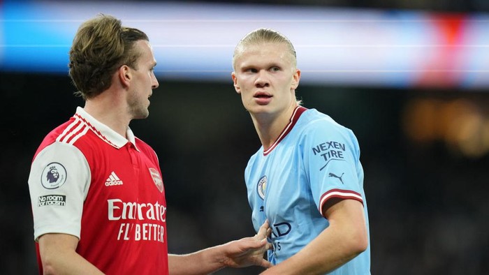 MANCHESTER, ENGLAND - APRIL 26: Erling Haaland of Manchester City and Rob Holding of Arsenal look on during the Premier League match between Manchester City and Arsenal FC at Etihad Stadium on April 26, 2023 in Manchester, England. (Photo by Tom Flathers/Manchester City FC via Getty Images)