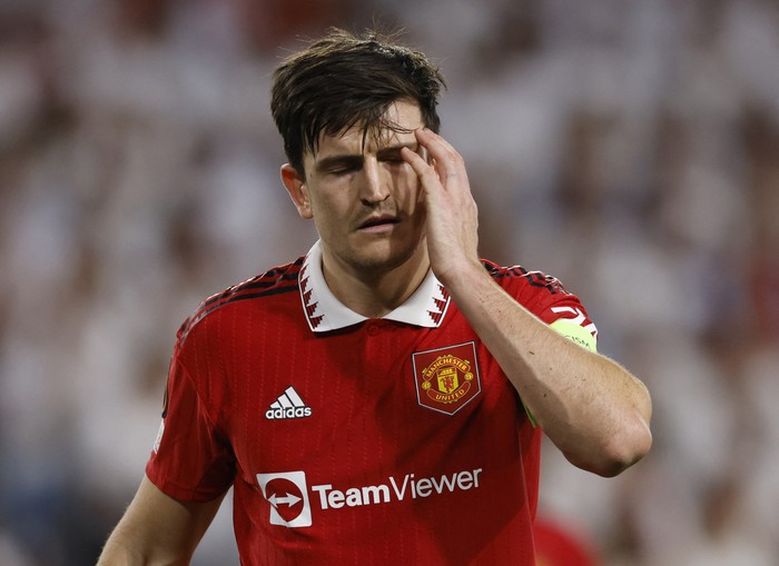 Soccer Football - Europa League - Quarter Final - Second Leg - Sevilla v Manchester United - Ramon Sanchez Pizjuan, Seville, Spain - April 20, 2023 Manchester Uniteds Harry Maguire reacts REUTERS/Marcelo Del Pozo