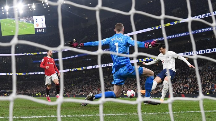 LONDON, ENGLAND - APRIL 27: Son Heung-Min of Tottenham Hotspur scores the teams second goal past David De Gea of Manchester United during the Premier League match between Tottenham Hotspur and Manchester United at Tottenham Hotspur Stadium on April 27, 2023 in London, England. (Photo by Shaun Botterill/Getty Images)