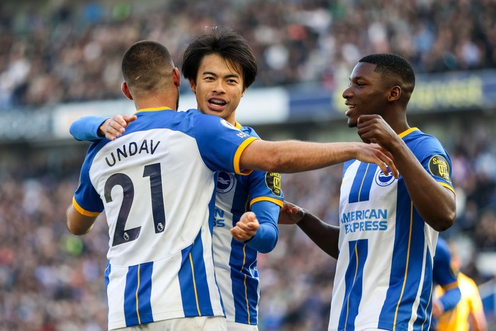 BRIGHTON, ENGLAND - APRIL 29: Deniz Undav of Brighton & Hove Albion is congratulated by team-mates Kaoru Mitoma and Moises Caicedo after he scores a goal to make it 6-0 during the Premier League match between Brighton & Hove Albion and Wolverhampton Wanderers at American Express Community Stadium on April 29, 2023 in Brighton, England. (Photo by Robin Jones/Getty Images)