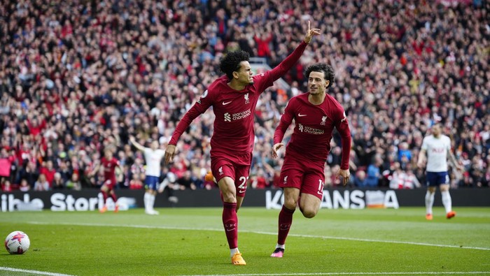 Liverpools Luis Diaz, left, celebrates after scoring his sides second goal during an English Premier League soccer match between Liverpool and Tottenham Hotspur at Anfield stadium in Liverpool, Sunday, April 30, 2023. (AP Photo/Jon Super)