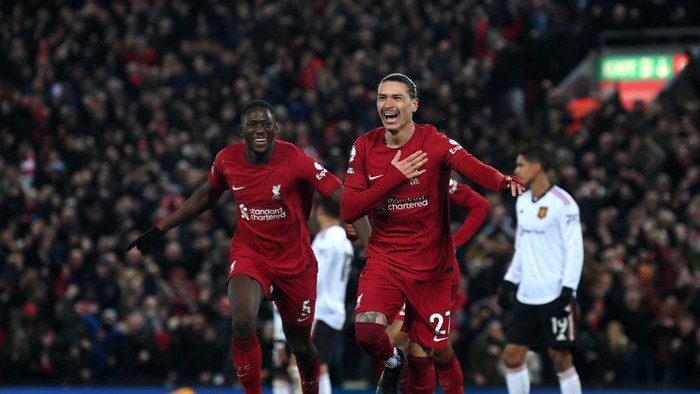 LIVERPOOL, ENGLAND - MARCH 05: Darwin Nunez of Liverpool celebrates after scoring the teams fifth goal with teammates during the Premier League match between Liverpool FC and Manchester United at Anfield on March 05, 2023 in Liverpool, England. (Photo by Michael Regan/Getty Images)