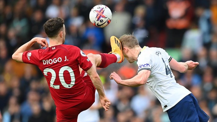 LIVERPOOL, ENGLAND - APRIL 30: Diogo Jota of Liverpool clashes with Oliver Skipp of Tottenham Hotspur causing an injury during the Premier League match between Liverpool FC and Tottenham Hotspur at Anfield on April 30, 2023 in Liverpool, England. (Photo by Michael Regan/Getty Images)