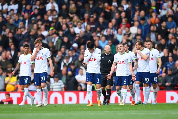 LIVERPOOL, ENGLAND - APRIL 30: Son Heung-min of Spurs and team mates look dejected after the third Liverpool goal during the Premier League match between Liverpool FC and Tottenham Hotspur at Anfield on April 30, 2023 in Liverpool, England. (Photo by Michael Regan/Getty Images)