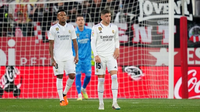 GIRONA, SPAIN - APRIL 25: Eder Militao and Federico Valverde of Real Madrid look dejected after Valentin Castellanos of Girona FC (not pictured) scores the teams first goal during the LaLiga Santander match between Girona FC and Real Madrid CF at Montilivi Stadium on April 25, 2023 in Girona, Spain. (Photo by Alex Caparros/Getty Images)