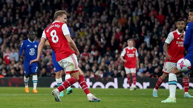 Arsenal's Martin Odegaard scores their sides second goal during the Premier League match at the Emirates Stadium, London. Picture date: Tuesday May 2, 2023. (Photo by Adam Davy/PA Images via Getty Images)
