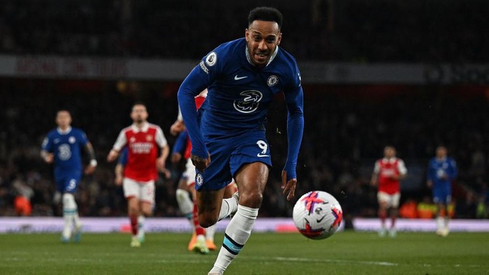 Chelseas Gabonese striker Pierre-Emerick Aubameyang chases the ball during the English Premier League football match between Arsenal and Chelsea at the Emirates Stadium, in London, on May 2, 2023. (Photo by Ben Stansall / AFP) / RESTRICTED TO EDITORIAL USE. No use with unauthorized audio, video, data, fixture lists, club/league logos or live services. Online in-match use limited to 120 images. An additional 40 images may be used in extra time. No video emulation. Social media in-match use limited to 120 images. An additional 40 images may be used in extra time. No use in betting publications, games or single club/league/player publications. /  (Photo by BEN STANSALL/AFP via Getty Images)