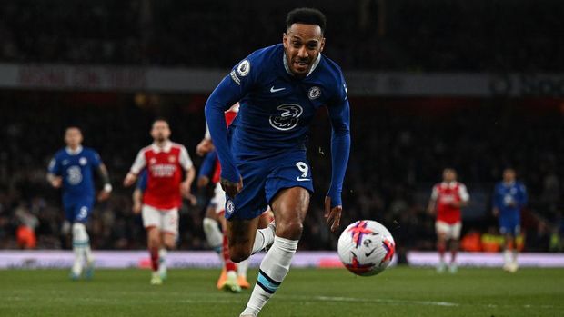 Chelsea's Gabonese striker Pierre-Emerick Aubameyang chases the ball during the English Premier League football match between Arsenal and Chelsea at the Emirates Stadium, in London, on May 2, 2023. (Photo by Ben Stansall / AFP) / RESTRICTED TO EDITORIAL USE. No use with unauthorized audio, video, data, fixture lists, club/league logos or 'live' services. Online in-match use limited to 120 images. An additional 40 images may be used in extra time. No video emulation. Social media in-match use limited to 120 images. An additional 40 images may be used in extra time. No use in betting publications, games or single club/league/player publications. /  (Photo by BEN STANSALL/AFP via Getty Images)