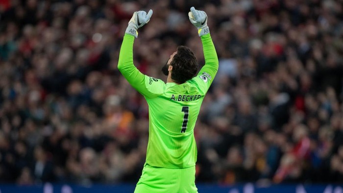 LIVERPOOL, ENGLAND - MAY 03: Liverpool goalkeeper Alisson Becker celebrates his teams goal during the Premier League match between Liverpool FC and Fulham FC at Anfield on May 3, 2023 in Liverpool, United Kingdom. (Photo by Joe Prior/Visionhaus via Getty Images)