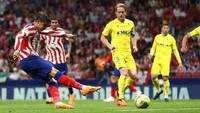 Tim tuan rumah tancap gas di babak kedua. Gol ketiga Atletico tercipta pada menit ke-52 lewat bola sepakan kaki kanan Alvaro Morata. Getty Images/Florencia Tan Jun  