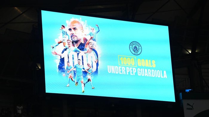 MANCHESTER, ENGLAND - MAY 03: The big screen shows that 1000 goals have been scored under Head Coach Pep Guardiola after the third City goal was scored during the Premier League match between Manchester City and West Ham United at Etihad Stadium on May 03, 2023 in Manchester, England. (Photo by Stu Forster/Getty Images)