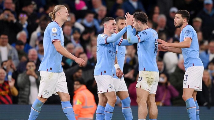 MANCHESTER, ENGLAND - MAY 03: Phil Foden of Manchester City celebrates with teammates after scoring the teams third goal during the Premier League match between Manchester City and West Ham United at Etihad Stadium on May 03, 2023 in Manchester, England. (Photo by Stu Forster/Getty Images)