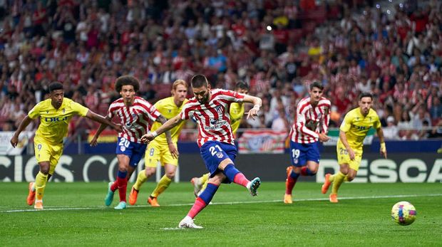 MADRID, SPAIN - MAY 03:  Yannick Carrasco of Atletico de Madrid shoots a penalty and scores his team's fourth goal during the LaLiga Santander match between Atletico de Madrid and Cadiz CF at Civitas Metropolitano Stadium on May 03, 2023 in Madrid, Spain. (Photo by Jose Manuel Alvarez/Quality Sport Images/Getty Images)