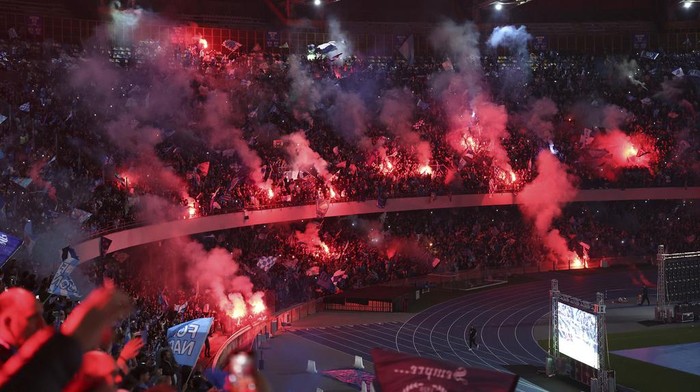 Napoli fans watch the Serie A soccer match between Udinese and Napoli on a large screen at the Diego Armando Maradona stadium in Naples, Italy, Thursday May 4, 2023. (Alessandro Garofalo/LaPresse via AP)