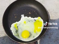 Tanpa Kompor! Pria Ini Viral Goreng Telur Manfaatkan Cuaca Panas di Depok