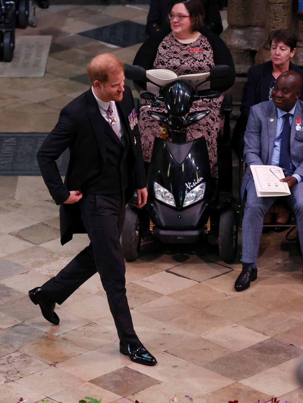 Britain's Prince Harry, Duke of Sussex, walks outside Westminster Abbey ahead of Britain's King Charles' coronation ceremony, in London, Britain May 6, 2023. REUTERS/Dylan Martinez     TPX IMAGES OF THE DAY