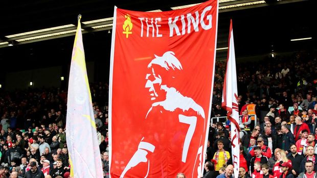 LIVERPOOL, ENGLAND - MAY 6: Liverpool fans hold a 