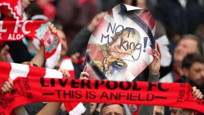 Liverpool fans hold up a sign saying Not My King while booing the national anthem before the Premier League match at Anfield, Liverpool. Picture date: Saturday May 6, 2023. (Photo by Mike Egerton/PA Images via Getty Images)