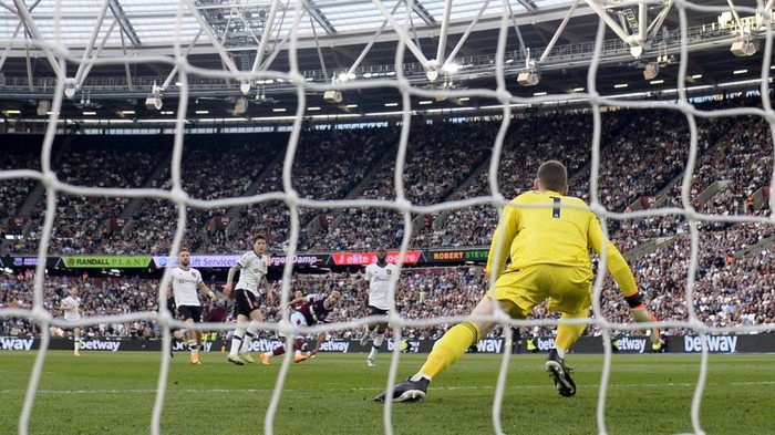 Soccer Football - Premier League - West Ham United v Manchester United - London Stadium, London, Britain - May 7, 2023 West Ham United's Said Benrahma scores their first goal past Manchester United's David de Gea REUTERS/Tony Obrien EDITORIAL USE ONLY. No use with unauthorized audio, video, data, fixture lists, club/league logos or 'live' services. Online in-match use limited to 75 images, no video emulation. No use in betting, games or single club /league/player publications.  Please contact your account representative for further details.