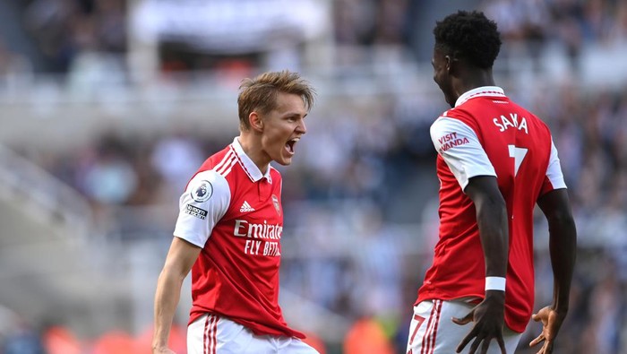 NEWCASTLE UPON TYNE, ENGLAND - MAY 07: Arsenal player Martin Odegaard celebrates after scoring the first Arsenal goal during the Premier League match between Newcastle United and Arsenal FC at St. James Park on May 07, 2023 in Newcastle upon Tyne, England. (Photo by Stu Forster/Getty Images)