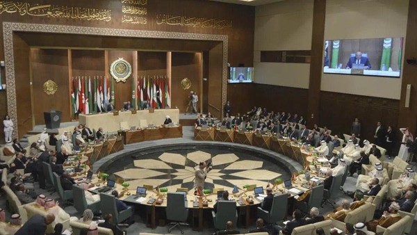 In this photo released by Egypts Ministry of Foreign Affairs, delegates and foreign ministers of member states convene at the Arab League headquarters in Cairo, Egypt, Sunday, May 7, 2023. The ministers are voting on restoring Syrias membership to the organization after it was suspended over a decade ago. The meeting comes after a rapid rapprochement between Syria and regional governments since February. (Egyptian Ministry of Foreign Affairs via AP)