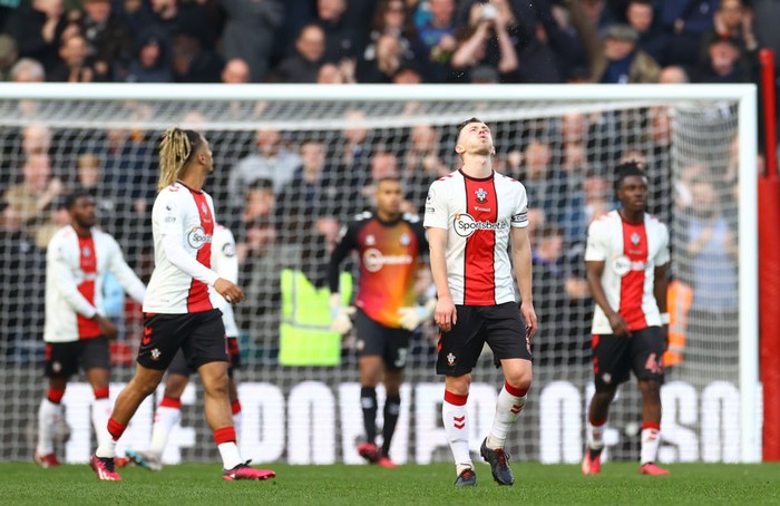SOUTHAMPTON, ENGLAND - MARCH 18: James Ward-Prowse of Southampton looks dejected after Ivan Perisic of Tottenham Hotspur scores the teams third goal during the Premier League match between Southampton FC and Tottenham Hotspur at Friends Provident St. Marys Stadium on March 18, 2023 in Southampton, England. (Photo by Michael Steele/Getty Images)