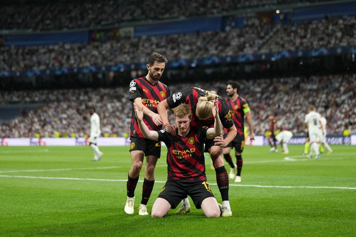 MADRID, SPAIN - MAY 09: Kevin De Bruyne of Manchester City celebrates after scoring the teams first goal during the UEFA Champions League semi-final first leg match between Real Madrid and Manchester City FC at Estadio Santiago Bernabeu on May 09, 2023 in Madrid, Spain. (Photo by Tom Flathers/Manchester City FC via Getty Images)