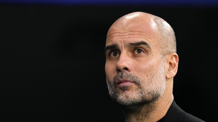 Manchester Citys head coach Pep Guardiola arrives for the Champions League semifinal first leg soccer match between Real Madrid and Manchester City at the Santiago Bernabeu stadium in Madrid, Spain, Tuesday, May 9, 2023. (AP Photo/Manu Fernandez)
