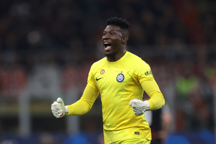 MILAN, ITALY - MAY 10: Andre Onana of FC Internazionale celebrates after team mate Henrikh Mkhitaryan scored to give the side a 2-0 lead during the UEFA Champions League semi-final first leg match between AC Milan and FC Internazionale at San Siro on May 10, 2023 in Milan, Italy. (Photo by Jonathan Moscrop/Getty Images)