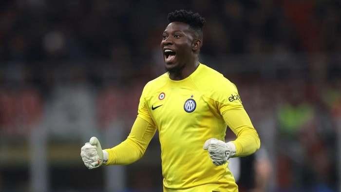 MILAN, ITALY - MAY 10: Andre Onana of FC Internazionale celebrates after team mate Henrikh Mkhitaryan scored to give the side a 2-0 lead during the UEFA Champions League semi-final first leg match between AC Milan and FC Internazionale at San Siro on May 10, 2023 in Milan, Italy. (Photo by Jonathan Moscrop/Getty Images)