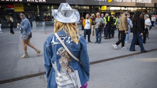 A fan of US musician Beyonce poses with her hand made jacket as she about to enter to the Friends Arena to watch her first concert of the World Tour named Renaissance, in Solna, north of Stockholm on May 10, 2023. Droves of fans were lined up on May 10, 2023 outside the Friends Arena in Stockholm, eagerly awaiting music royalty Beyonce, who marked the first concert on her new tour. The 