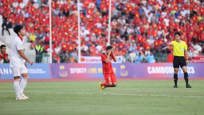 Ekspresi pemain Timnas Indonesia U-22, Muhammad Taufany, usai merobek gawang Vietnam di injury time.