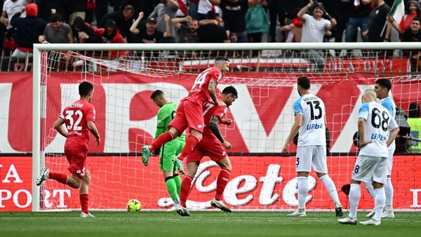 Napolis Italian forward Andrea Petagna (C) celebrates after scoring his sides second goal during the Italian Serie A football match between Monza and Napoli on May 14, 2023 at the Brianteo stadium in Monza. (Photo by GABRIEL BOUYS / AFP) (Photo by GABRIEL BOUYS/AFP via Getty Images)