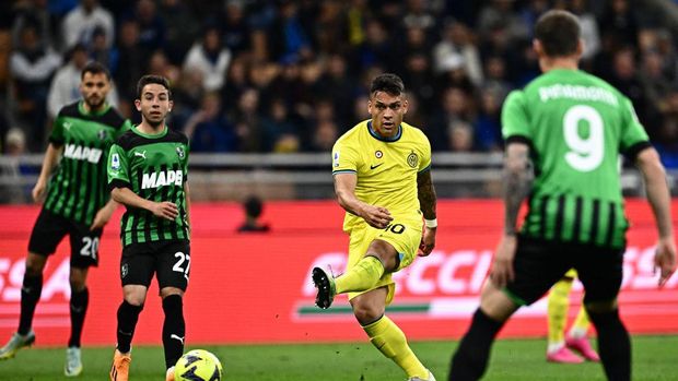 Inter Milan vs Sassuolo Inter Milan's Argentinian forward Lautaro Martinez shoots to score his side's third goal during the Italian Serie A football match between Inter and Sassuolo on May 13, 2023 at the Giuseppe-Meazza (San Siro) stadium in Milan. (Photo by GABRIEL BOUYS / AFP) (Photo by GABRIEL BOUYS/AFP via Getty Images)