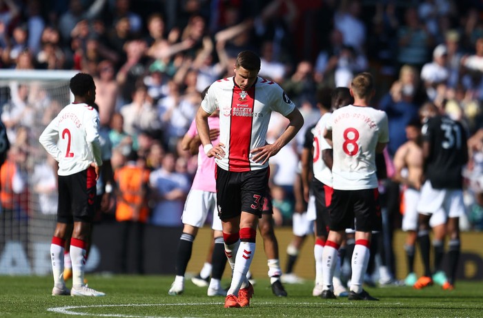 SOUTHAMPTON, ENGLAND - MAY 13: Jan Bednarek of Southampton looks dejected after the Premier League match between Southampton FC and Fulham FC at Friends Provident St. Marys Stadium on May 13, 2023 in Southampton, England. (Photo by Charlie Crowhurst/Getty Images)