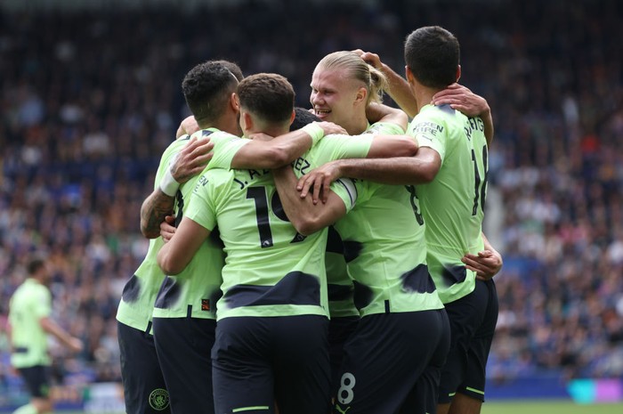 LIVERPOOL, ENGLAND - MAY 14: Erling Haaland of Manchester City celebrates with team mates after scoring the teams second goal during the Premier League match between Everton FC and Manchester City at Goodison Park on May 14, 2023 in Liverpool, England.  (Photo by Clive Brunskill/Getty Images)