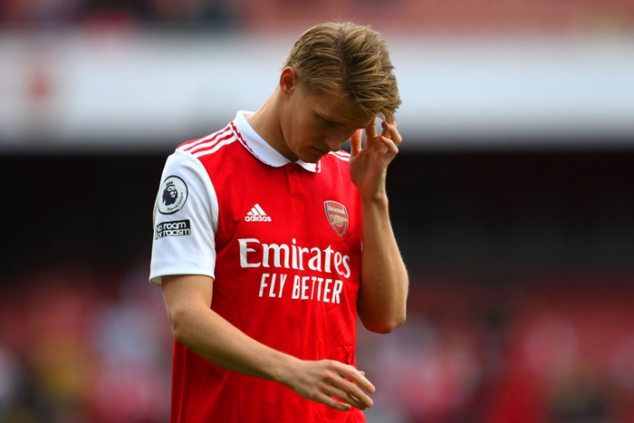 LONDON, ENGLAND - MAY 14: Martin Odegaard of Arsenal looks dejected following the teams defeat during the Premier League match between Arsenal FC and Brighton & Hove Albion at Emirates Stadium on May 14, 2023 in London, England. (Photo by Shaun Botterill/Getty Images)