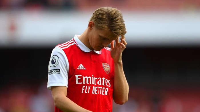 LONDON, ENGLAND - MAY 14: Martin Odegaard of Arsenal looks dejected following the teams defeat during the Premier League match between Arsenal FC and Brighton & Hove Albion at Emirates Stadium on May 14, 2023 in London, England. (Photo by Shaun Botterill/Getty Images)