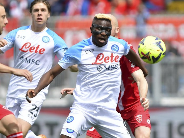 Napoli's Victor Osimhen eyes the ball during the Serie A soccer match between Monza and Napoli at the U-Power stadium in Monza, Italy, Sunday, May 14, 2023. (Claudio Grassi/LaPresse via AP)