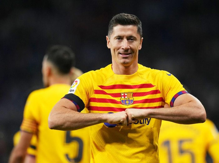 BARCELONA, SPAIN - MAY 14: Robert Lewandowski of FC Barcelona celebrates after scoring the team's first goal during the LaLiga Santander match between RCD Espanyol and FC Barcelona at RCDE Stadium on May 14, 2023 in Barcelona, Spain. (Photo by Alex Caparros/Getty Images)