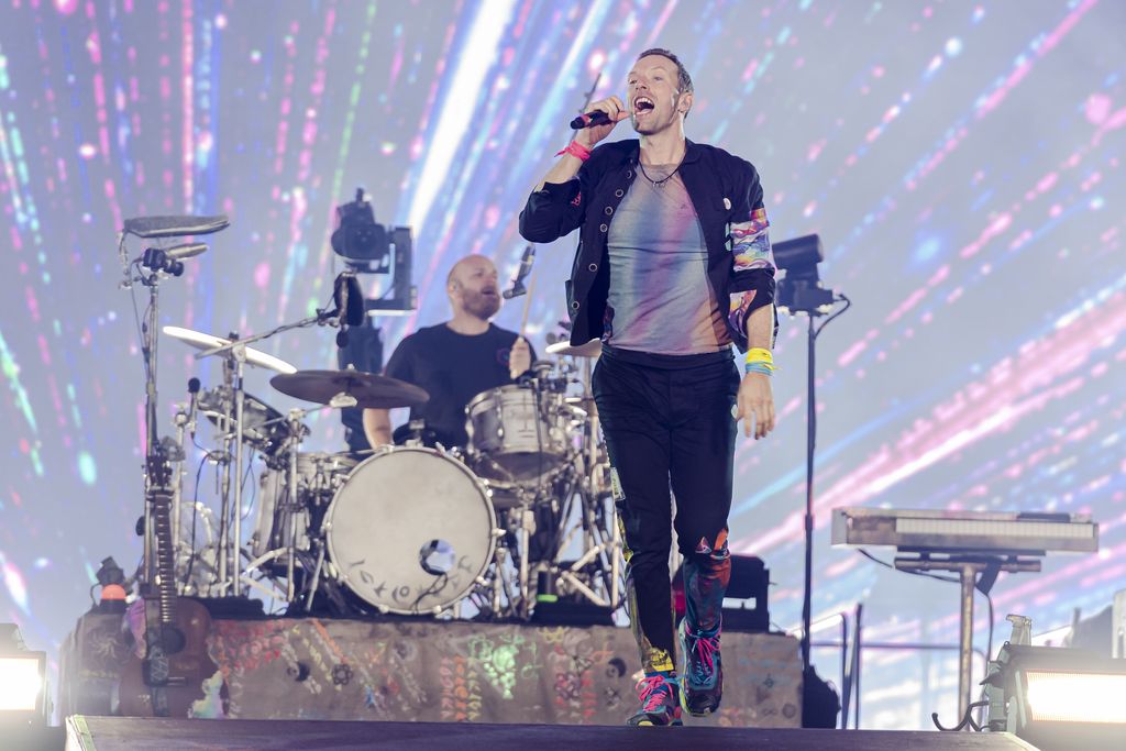 GLASGOW, SCOTLAND - AUGUST 23: (Editorial Use Only) Chris Martin and Will Champion of Coldplay perform at Hampden Park on August 23, 2022 in Glasgow, Scotland. (Photo by Euan Cherry/Getty Images)