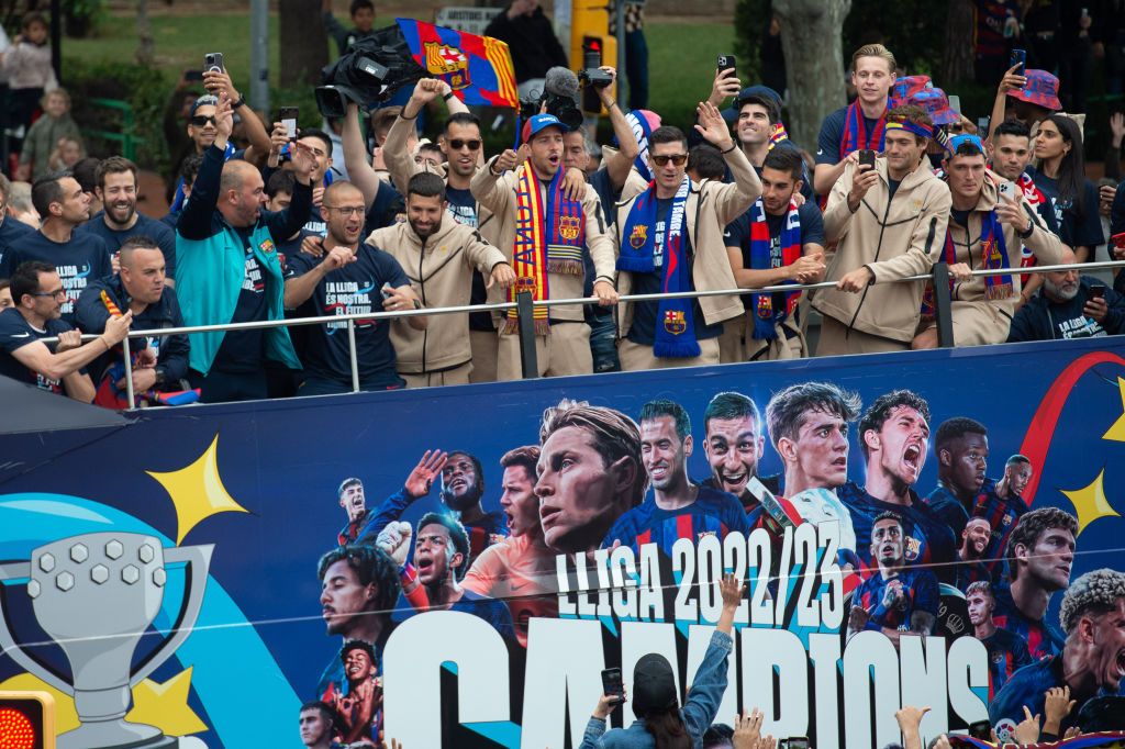 BARCELONA, SPAIN - MAY 15: The players of FC Barcelona football team on open-top bus leave Camp Nou Stadium to celebrate La Liga title in Barcelona on May 15, 2023. (Photo by Adria Puig/Anadolu Agency via Getty Images)
