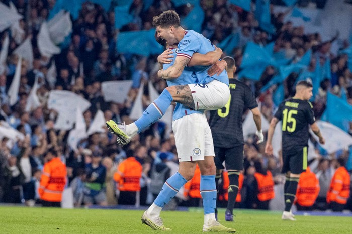 Manchester City MANCHESTER, ENGLAND - MAY 17: Manuel Akanji celebrates with Erling Haaland of Manchester City after scoring the team's third goal during the UEFA Champions League semi-final second leg match between Manchester City FC and Real Madrid at Etihad Stadium on May 17, 2023 in Manchester, England. (Photo by Michael Regan/Getty Images)