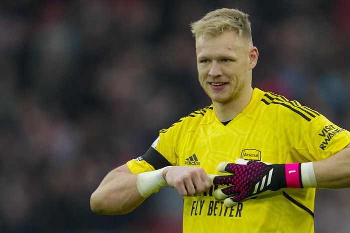 Arsenals goalkeeper Aaron Ramsdale smiles at the end of the English Premier League soccer match between Liverpool and Arsenal at Anfield in Liverpool, England, Sunday, April 9, 2023. (AP Photo/Jon Super)