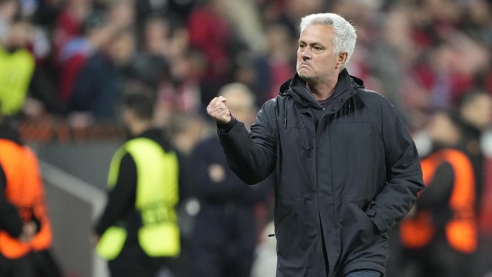 Romas head coach Jose Mourinho celebrates after the Europa League semifinal second leg soccer match between Bayer Leverkusen and Roma at the BayArena in Leverkusen, Germany, Thursday, May 18, 2023.(AP Photo/Martin Meissner)