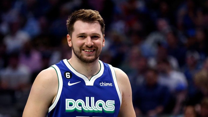 DALLAS, TX - APRIL 5: Luka Doncic #77 of the Dallas Mavericks reacts as the Mavericks play the Sacramento Kings in the second half at American Airlines Center on April 5, 2023 in Dallas, Texas. The Mavericks won 123-119. NOTE TO USER: User expressly acknowledges and agrees that, by downloading and or using this photograph, User is consenting to the terms and conditions of the Getty Images License Agreement. (Photo by Ron Jenkins/Getty Images)