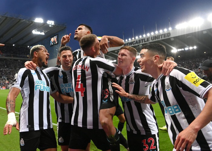 NEWCASTLE UPON TYNE, ENGLAND - MAY 18: Bruno Guimaraes of Newcastle (c) celebrates with team mates after scoring the fourth goal during the Premier League match between Newcastle United and Brighton & Hove Albion at St. James Park on May 18, 2023 in Newcastle upon Tyne, England. (Photo by Stu Forster/Getty Images)