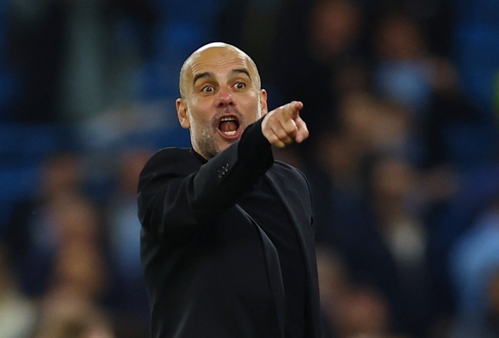 Soccer Football - Champions League - Semi Final - Second Leg - Manchester City v Real Madrid - Etihad Stadium, Manchester, Britain - May 17, 2023 Manchester City manager Pep Guardiola celebrates after the match REUTERS/Molly Darlington