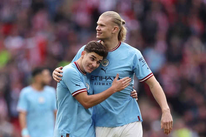 LONDON, ENGLAND - APRIL 22: Julian Alvarez and Erling Haaland of Manchester City celebrate after the teams victory during the FA Cup Semi Final match between Manchester City and Sheffield United at Wembley Stadium on April 22, 2023 in London, England. (Photo by Alex Pantling - The FA/The FA via Getty Images)